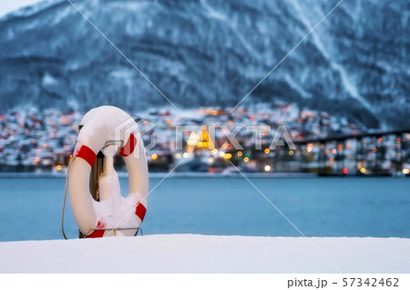 Lifebuoy covered in snow Lifebuoy covered in snow 57342462