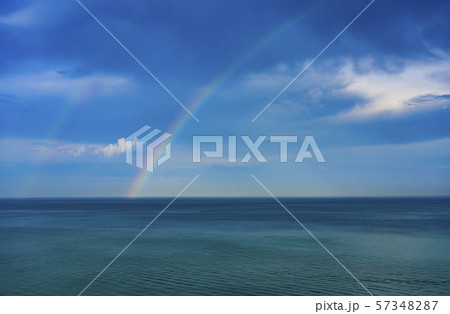 Rainbow over seascape 57348287