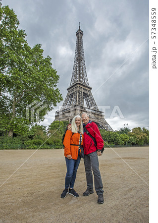 Smiling couple by Eiffel Tower in Paris, France 57348559