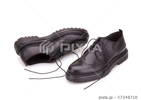 Scattered men's shoes with lace. Scattered men's shoes with lace. 57349710