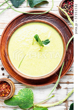 Fresh asparagus soup in bowl 57351532