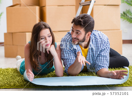Young family planning home refurbishing in DIY concept 57352101