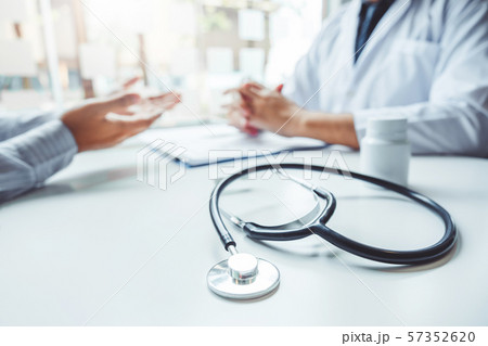 Doctors and patients consulting and diagnostic 57352620