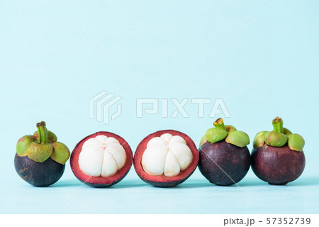 Mangosteen on pastel color background Mangosteen on pastel color background 57352739