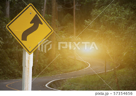 Curve road mountain landscape and glowing light at 57354656