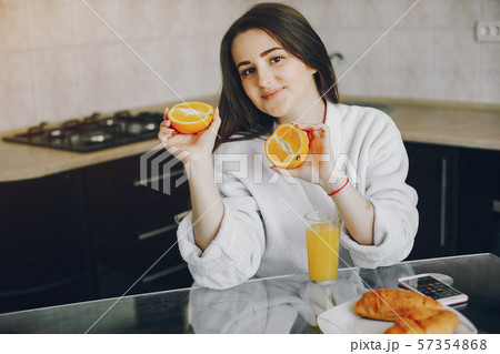 girl in a white dressing gown girl in a white dressing gown 57354868