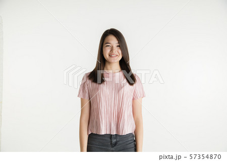 Beautiful girl's half-length portrait on white studio background 57354870