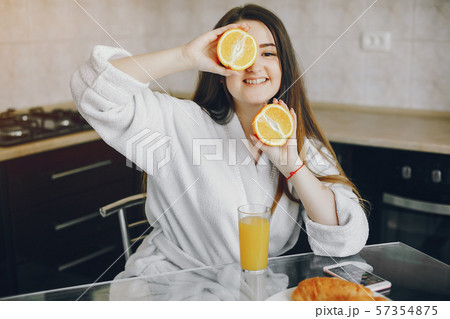 girl in a white dressing gown 57354875