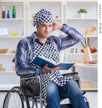 Young man cook with book of food recipes 57355167