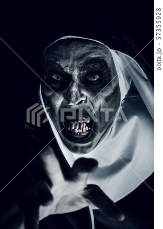 frightening evil nun with bloody teeth frightening evil nun with bloody teeth 57355928