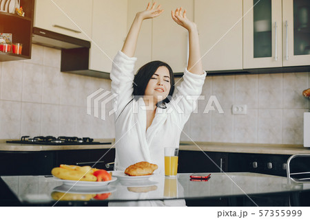girl in a white dressing gown 57355999