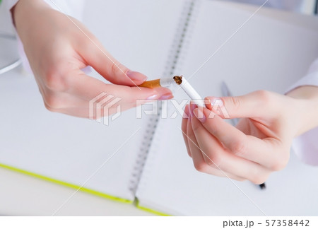 Doctor in anti smoking concept 57358442