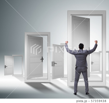 Businessman facing many business opportunities Businessman facing many business opportunities 57359438