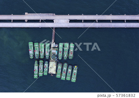 Top view of Tugboat in sea port, logistics and industrial ship Top view of Tugboat in sea port, logistics and industrial ship 57361832
