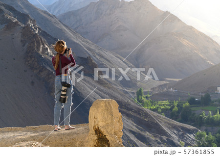 Young asian woman taking photos of landscape 57361855