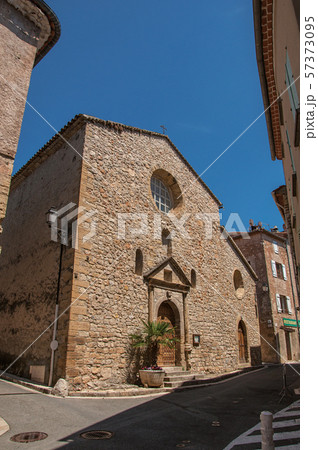 Stone facade of ancient church in Chateaudouble 57373095