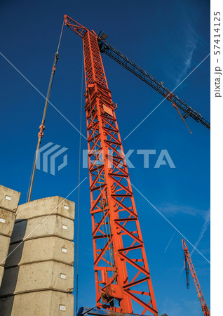 Close-up of crane in a construction area at sunset in Tielt 57414125