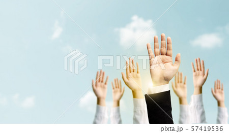 Group of hand businessmen raised the sky 57419536