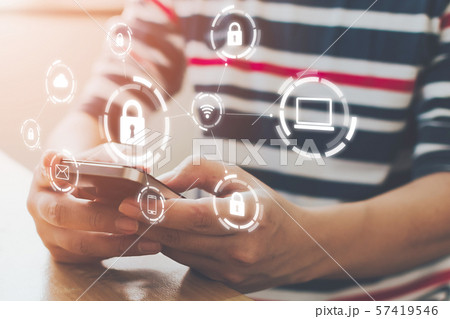 Close-up image of male hands using mobile 57419546