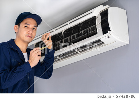 Technician service using screwdriver to repairing Technician service using screwdriver to repairing 57428786