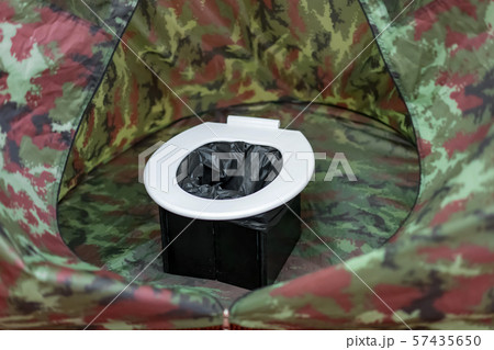 portable toilets in tent at camping public 57435650