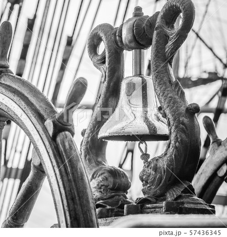 Ship's Bell and wheel the old sailboat, close-up 57436345