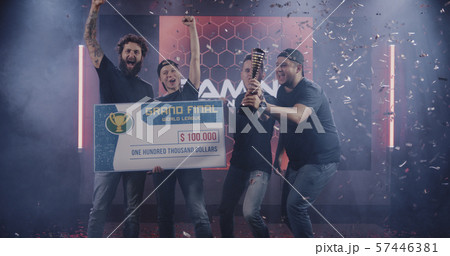 Gaming tournament team celebrating their victory Gaming tournament team celebrating their victory 57446381