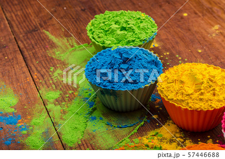 Holi color powder. Organic Gulal colours in bowl for Holi festival