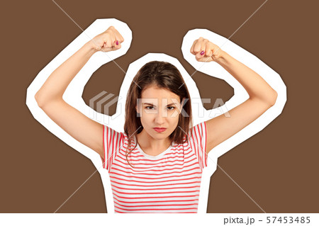 crazy girl shows her biceps. emotional girl crazy girl shows her biceps. emotional girl 57453485