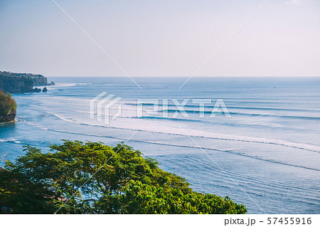 Blue big waves for surfing in Bali, Tropical tree and ocean waves in Indonesia 57455916