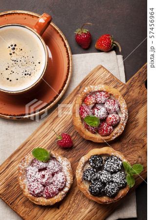 Set of cakes with berries 57456964