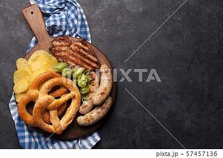 Oktoberfest set. Pretzels, sausages and chips Oktoberfest set. Pretzels, sausages and chips 57457136