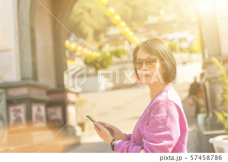 woman using the cellphone woman using the cellphone 57458786