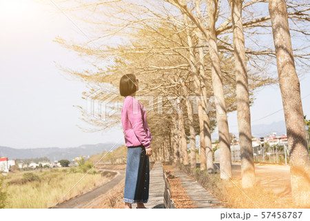 Asian woman stand in the outside Asian woman stand in the outside 57458787