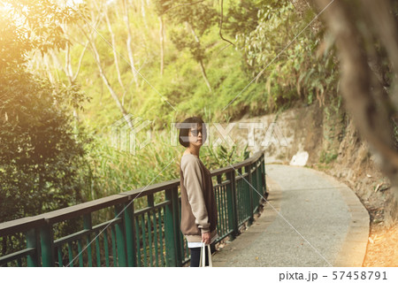 Asian woman hiking Asian woman hiking 57458791