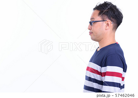 Profile view of Japanese hipster man with eyeglasses Profile view of Japanese hipster man with eyeglasses 57462046