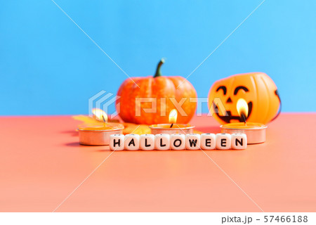 Halloween background candlelight orange and blue Halloween background candlelight orange and blue 57466188