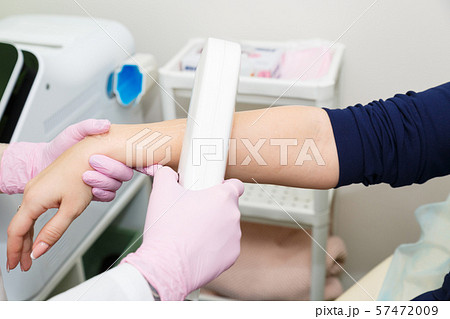 Hair depilation in the beauty salon. Laser hair Hair depilation in the beauty salon. Laser hair 57472009