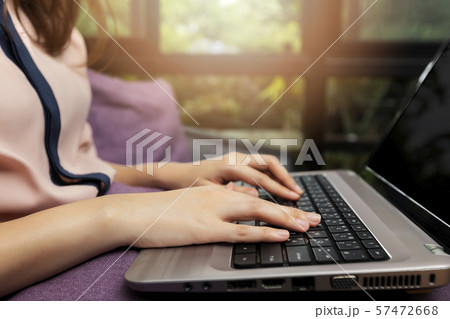 Closeup of businesswoman hands on laptop at office desk. Closeup of businesswoman hands on laptop at office desk. 57472668