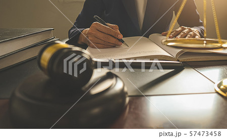 Judge gavel with Justice lawyers having team 57473458