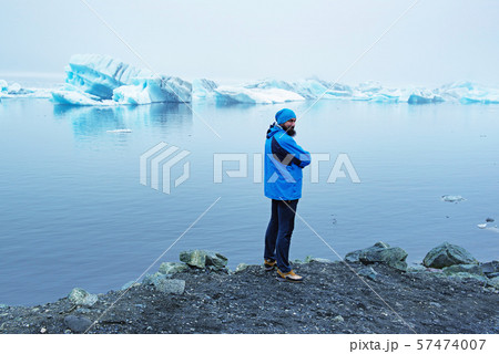 Man near glacier 57474007