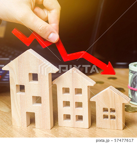 The concept of falling real estate market. Reduced The concept of falling real estate market. Reduced 57477617