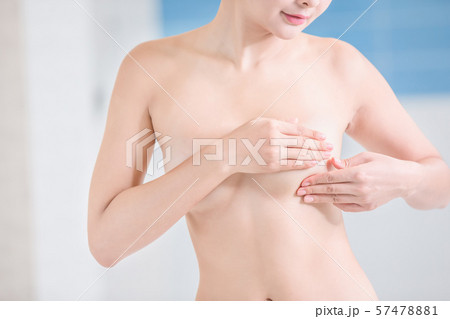 Breast cancer self check concept Breast cancer self check concept 57478881