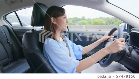 asian woman driving car 57479150