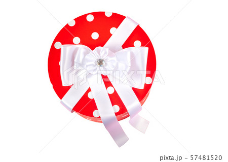 Gift box with colored ribbon isolated on a white Gift box with colored ribbon isolated on a white 57481520