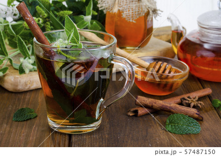 Herbal tea with mint and honey. Photo 57487150