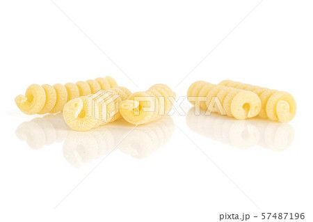 Raw pasta fusilli bucati isolated on white Raw pasta fusilli bucati isolated on white 57487196