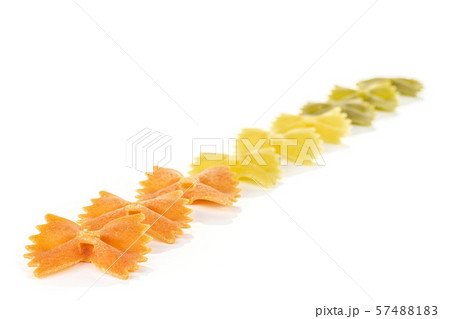 Raw farfalle tricolore isolated on white Raw farfalle tricolore isolated on white 57488183