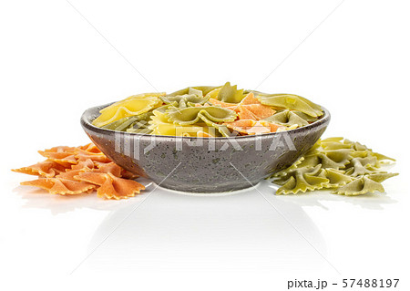 Raw farfalle tricolore isolated on white 57488197