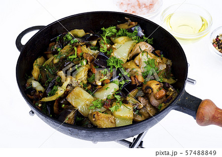 Vegetable stew pan saute isolated on white Vegetable stew pan saute isolated on white 57488849